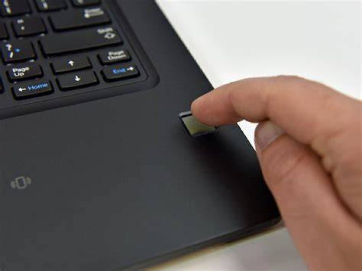 How do I turn on fingerprint sensor on Dell laptop Windows 7?