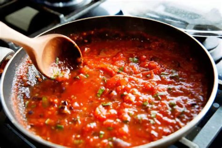 How do you add richness to tomato sauce?