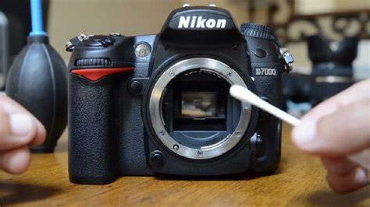 How do you clean a Nikon viewfinder?