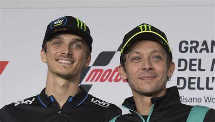 How is Valentino Rossi related to Luca Marini?