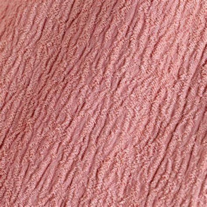 What does crepe fabric feel like?