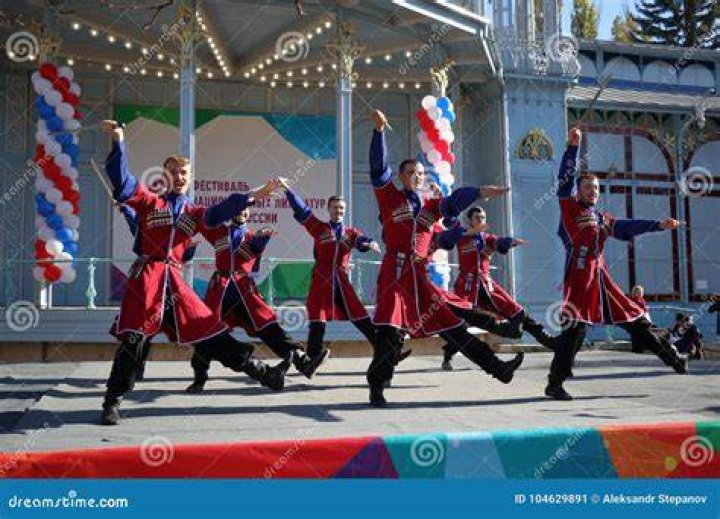What is the purpose of the Cossack dance?
