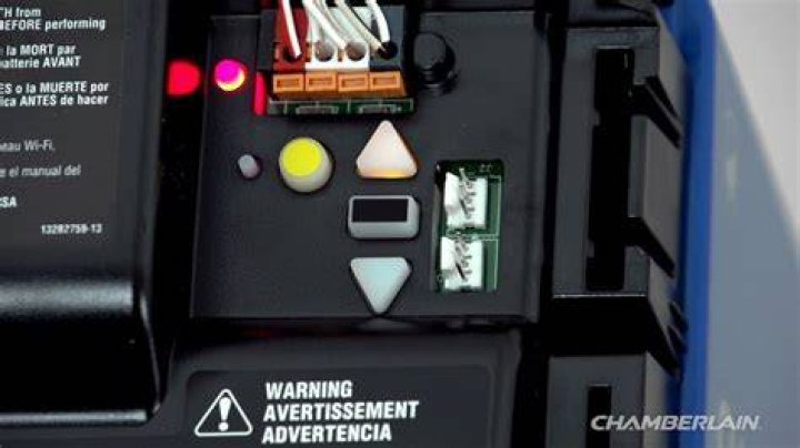 Where is the Learn button on myQ control panel?